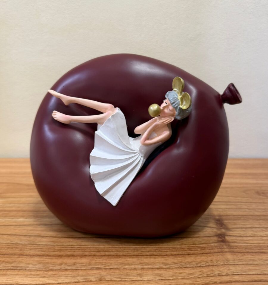 ESCULTURA NIÑA EN GLOBO